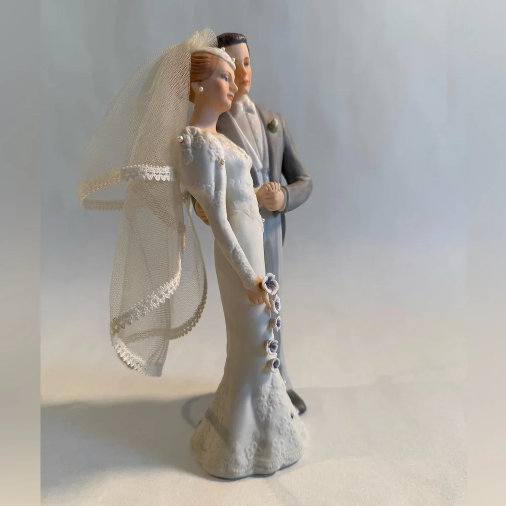 Elegant Wedding Cake Topper with Veil and Floral Accents